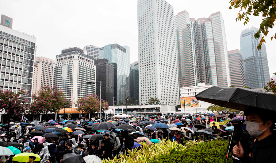 More than 1,000 gather for rain-soaked Hong Kong rally | Arab News