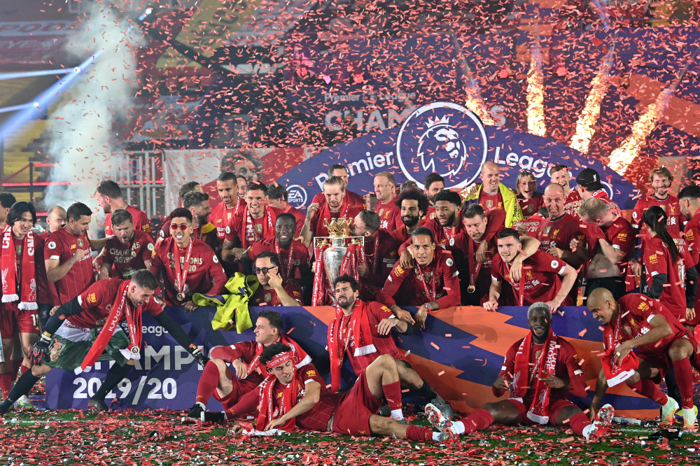 Liverpool Players Receive Premier League Trophy On Kop Arab News