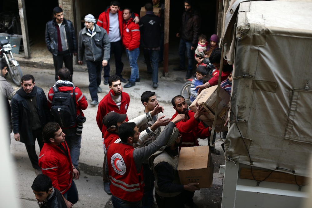 News that several COVID-19 vaccines are passing advanced trials and getting licensed for use has been met with relief and jubilation, but the challenge will be distributing them in the Middle East. (AFP/File Photo)