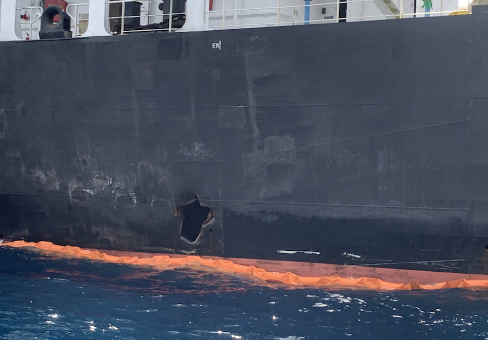 Two oil tankers were damaged in twin attacks close to the Iranian coast on June 13, 2020, just outside the Strait of Hormuz. The Kokuka Courageous was struck in the Gulf of Oman by a limpet mine resembling Iranian weapons, according to the US military in the Middle East. (AFP)