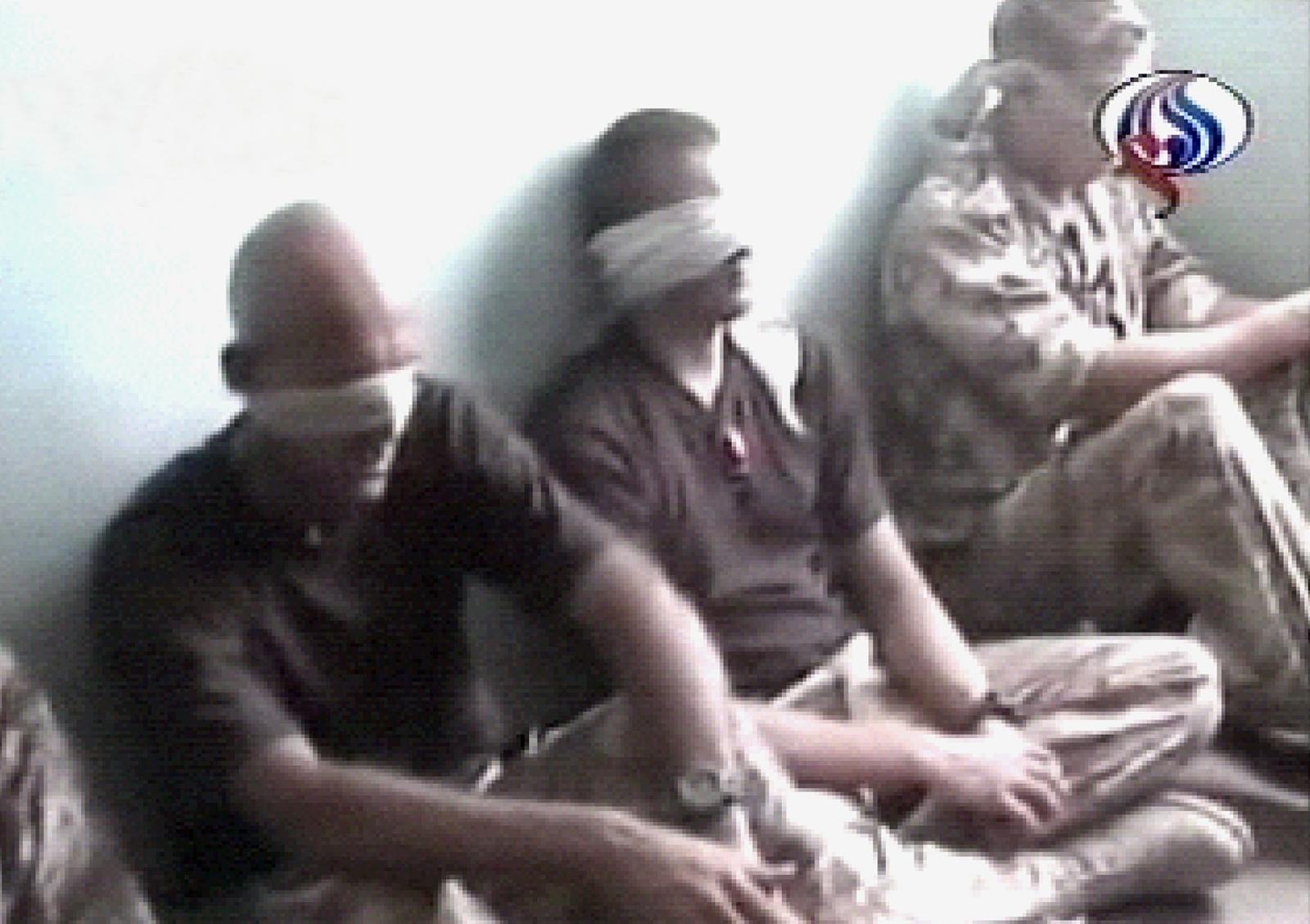 Detained by Iranian troops in June 2004, eight British servicemen were made to march blindfolded on the banks of the Shatt al-Arab waterway after they allegedly strayed into Iranian waters. The Shatt al-Arab straddles the border between Iran and southern Iraq. (AFP/File Photo)