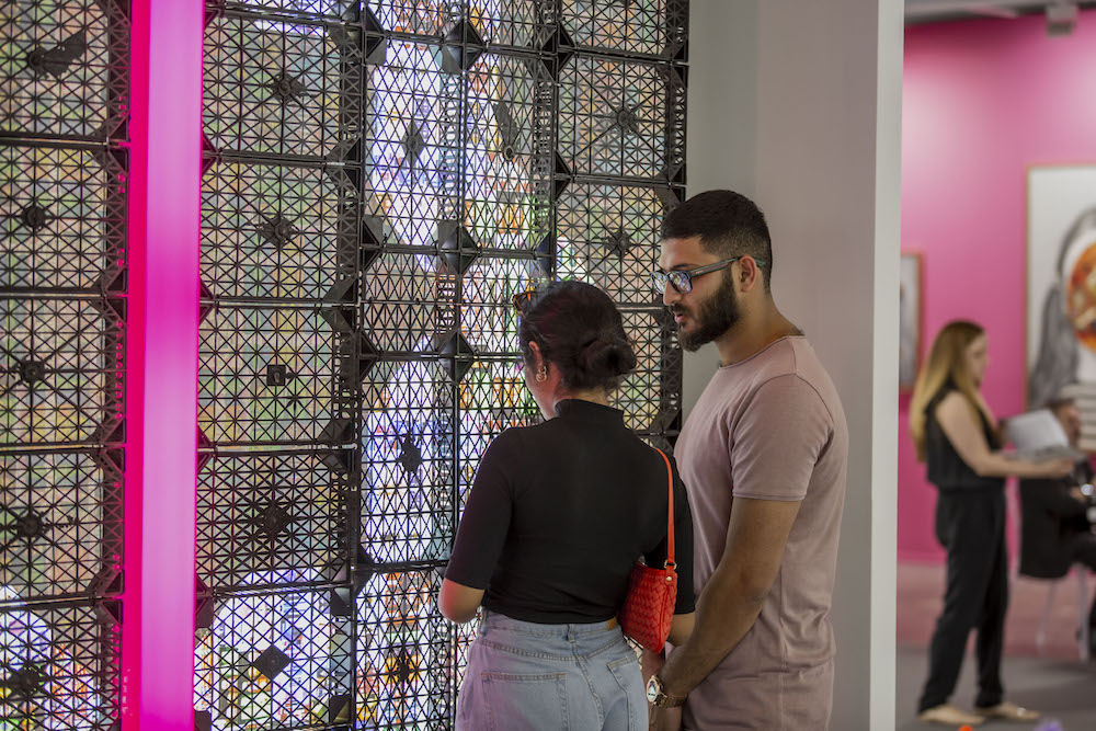 Art-lovers peruse a piece at the Hafez Gallery. (Courtesy: Photo Solutions)