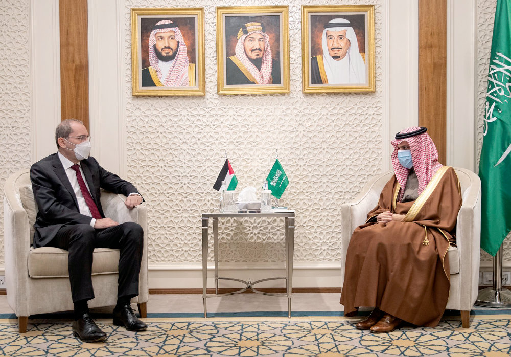 Saudi Foreign Minister Prince Faisal bin Farhan (right) receives Jordanian FM Ayman Al-Safadi at his office in Riyadh. (SPA)