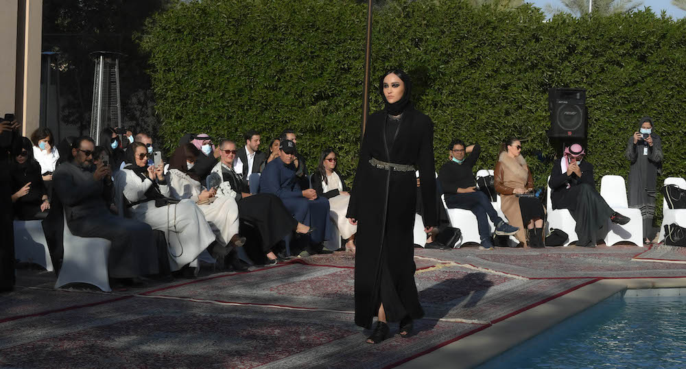 Princess Hannah Al-Faisal, granddaughter of the late minister of foreign affairs Saud Al-Faisal, walks the runway showcasing her mother’s designs. (AN Photo/Basheer Saleh)