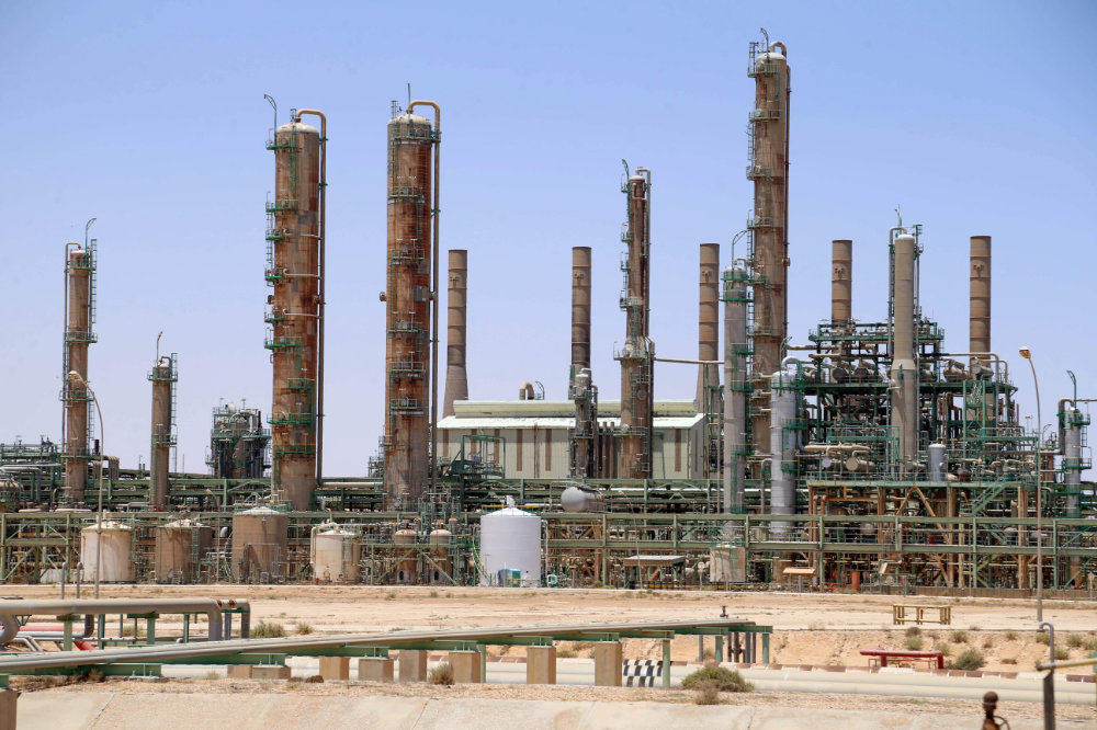 This file photo taken on June 3, 2020 shows an oil refinery in Libya's northern town of Ras Lanuf. Global oil prices have been stable since early January, with Brent crude price hovering around $55.  (AFP)