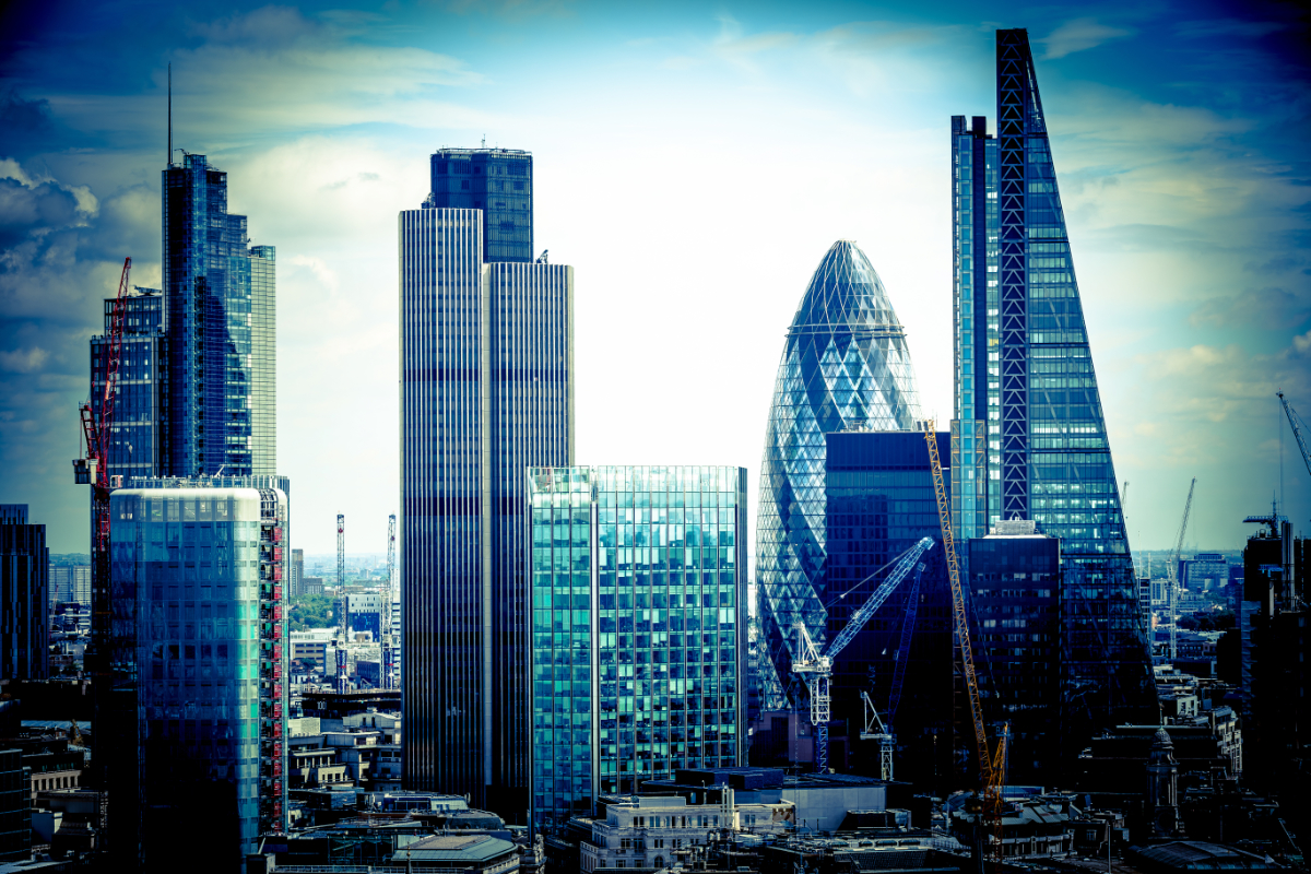 Skyline view of the famous financial bank district of London at golden sunset hour. View includes skyscrapers, office buildings and beautiful dramatic sky. (Shutterstock)