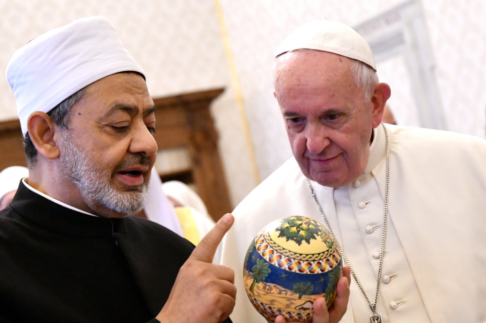 Pope Francis (R) receives a gift from Egypt's Azhar Grand Imam Sheikh Ahmed al-Tayeb during a private audience on November  15, 2019 at the Vatican. (AFP file photo)