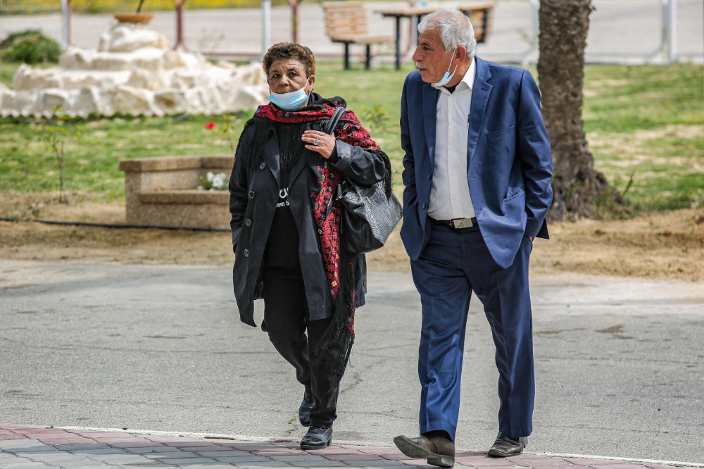 Maryam Abu Daqqa (left) and Mahmoud al-Zaq comprise the Fatah delegation in the talks with Hamas on the Palestinian elections. (AFP / SAID KHATIB) 