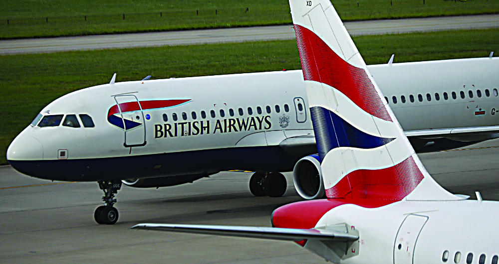 Shares in IAG, owner of British Airways, traded down 3.6 percent at 207 pence at 1132 on Friday. (Reuters/File)