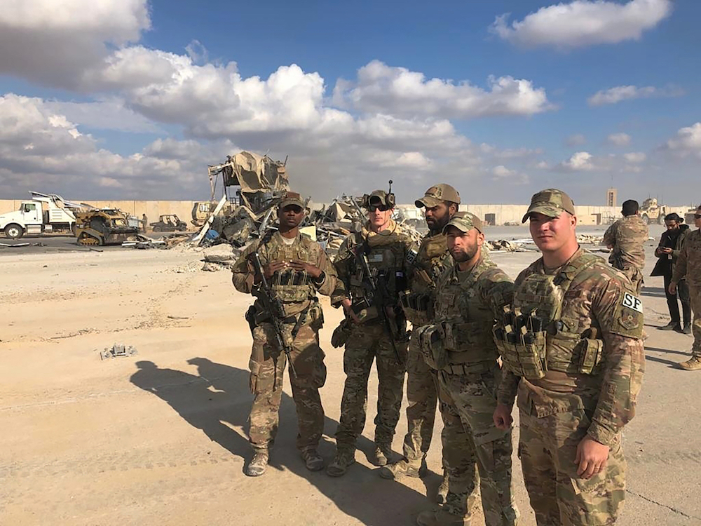 US soldiers stand at a site of Iranian bombing at Ain Al-Asad air base in Anbar, Iraq. (File/AP)