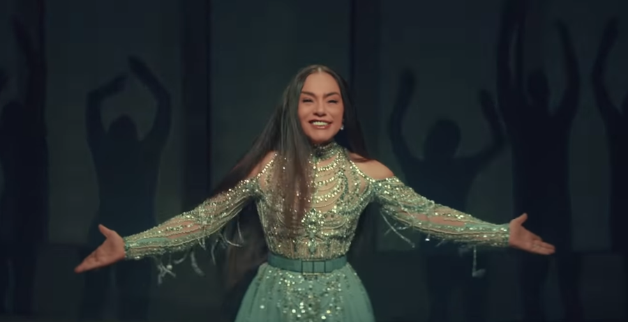 Sherihan wore custom Zuhair Murad for her on-screen return. YouTube