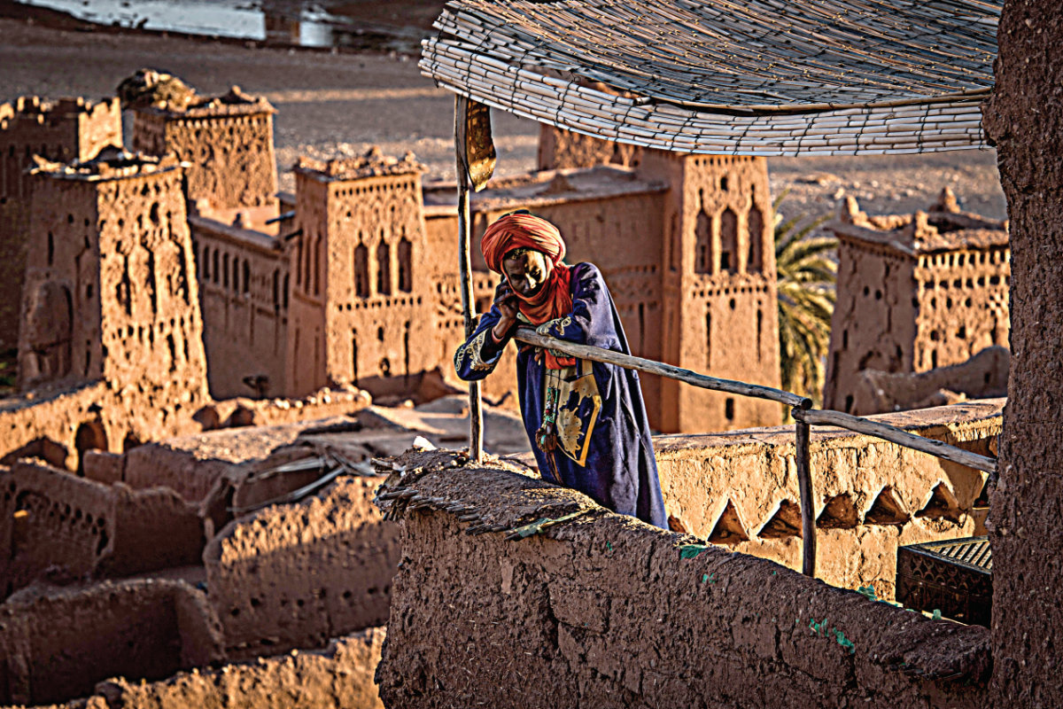 A man stands atop the ancient fortress of Ait-ben-Haddou, where scenes depicting the fictional city of Yunkai from ‘Game of Thrones’ were filmed. (Getty Images)