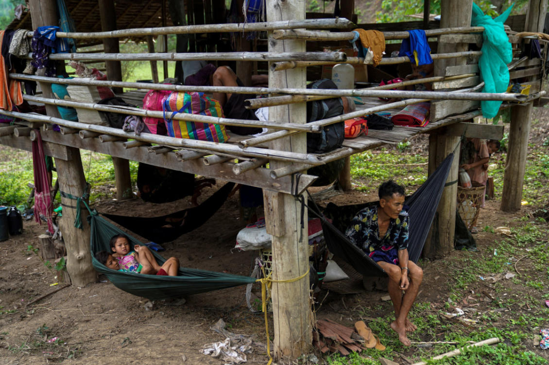 Villagers who fled Myanmar's Ee Thu Hta displacement camp rest in Mae Hong Son province, Thailand, near the border. (REUTERS)