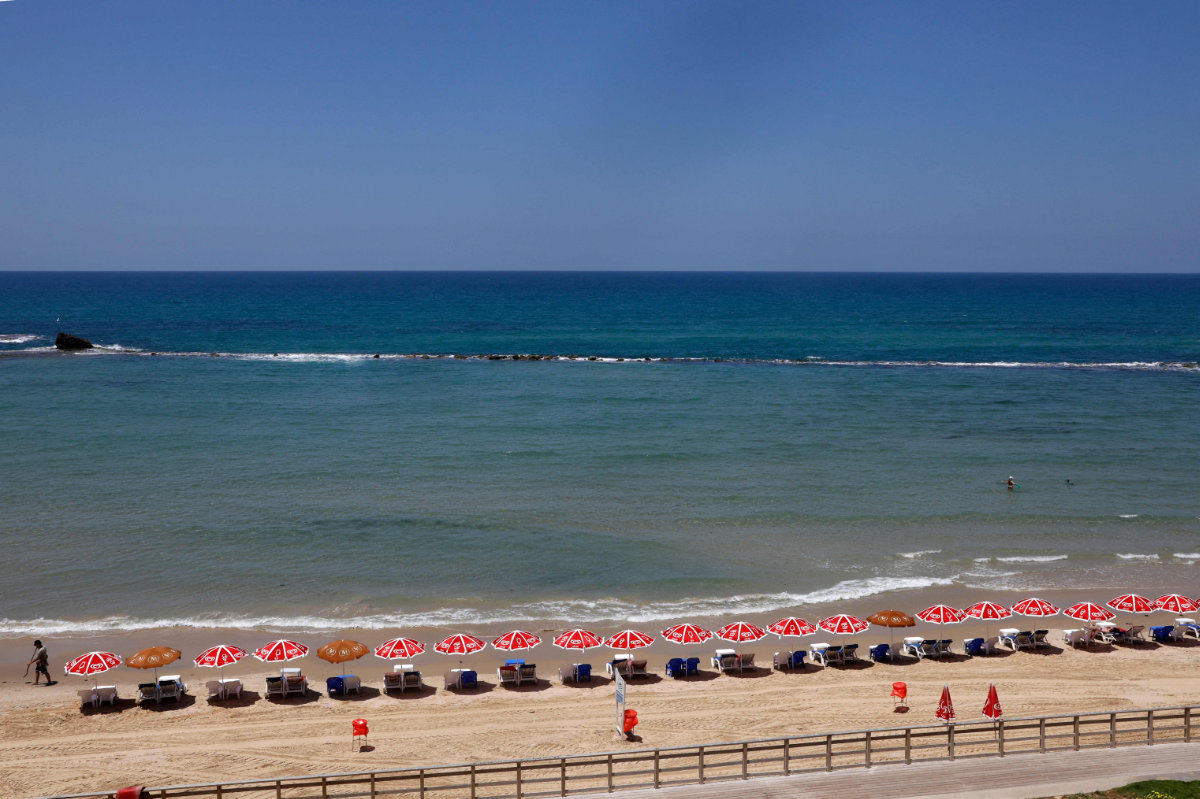 A picture shows an empty beach in Israel's Mediterranean city of Bat Yam on May 13, 2021 amid an escalation of violence between Israeli forces and Palestinian militants. (AFP)