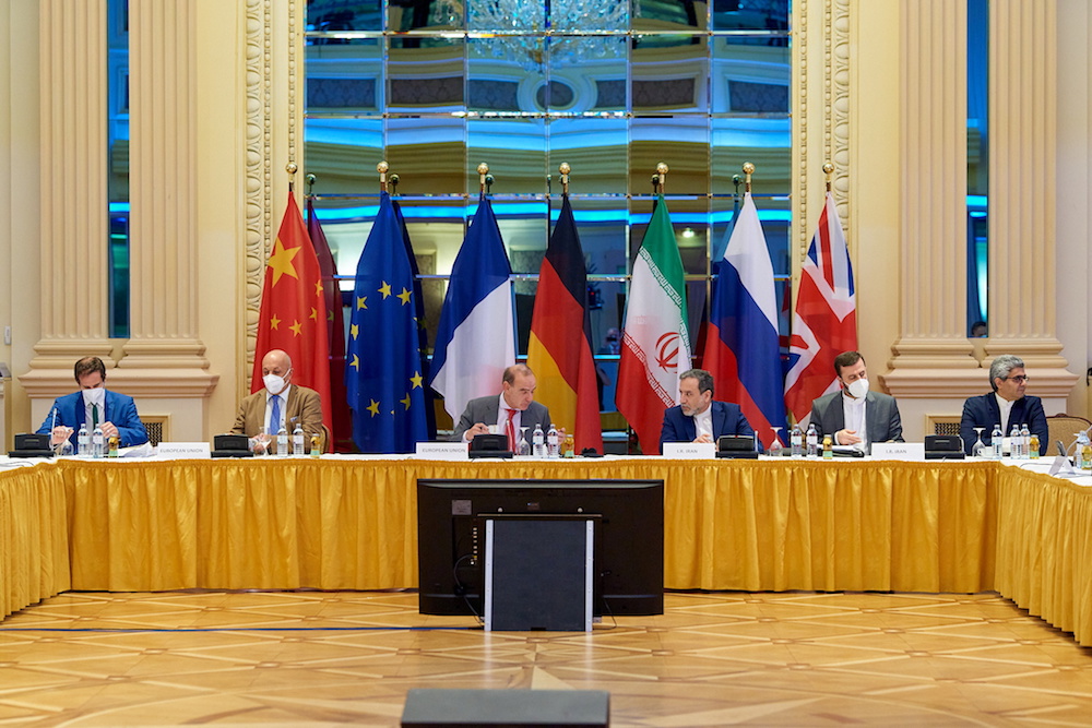 EEAS Deputy Secretary General Enrique Mora and Iranian Deputy at Ministry of Foreign Affairs Abbas Araghchi wait for the start of talks on reviving the 2015 Iran nuclear deal in Vienna. (Reuters)