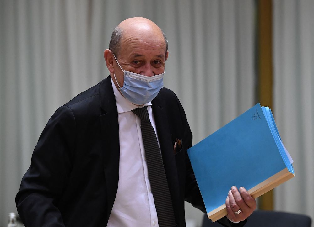 French Foreign minister Jean Yves Le Drian arrives for a Foreign Affairs Council meeting at the EU headquarters in Brussels on July 12, 2021. (AFP)