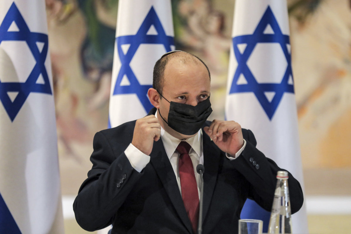 Israeli Prime Minister Naftali Bennett chairs the weekly cabinet meeting at the Knesset in Jerusalem on July 19, 2021. (Gil Cohen-Magen/Pool Photo via AP)