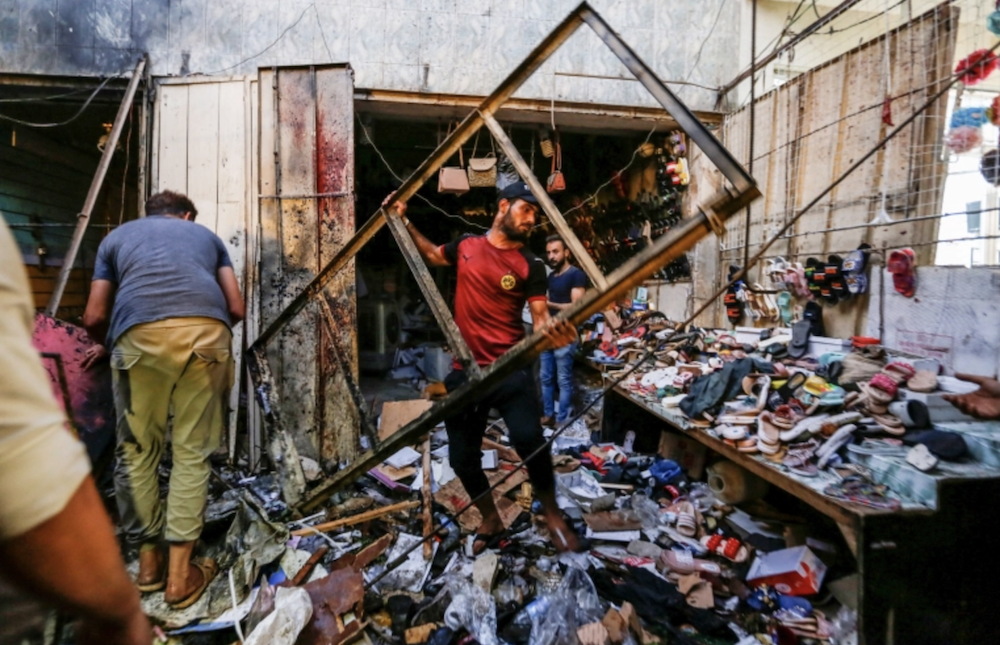 The blast, the deadliest in the Iraqi capital over the past six months, took place in Al-Wuhailat market as families prepared for Eid Al-Adha. (Reuters)