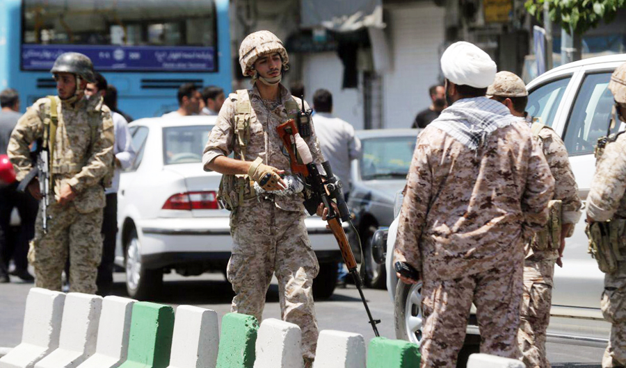 Members of the Iranian Revolutionary Guard secure the area outside the Iranian parliament. (AFP file photo)