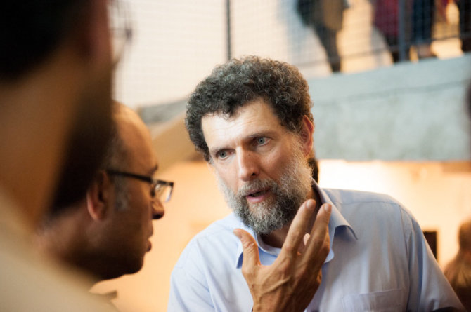 An undated handout file photograph released on Oct. 15, 2021, by Anadolu Culture Center shows Osman Kavala speaking during an event in Istanbul. (AFP)