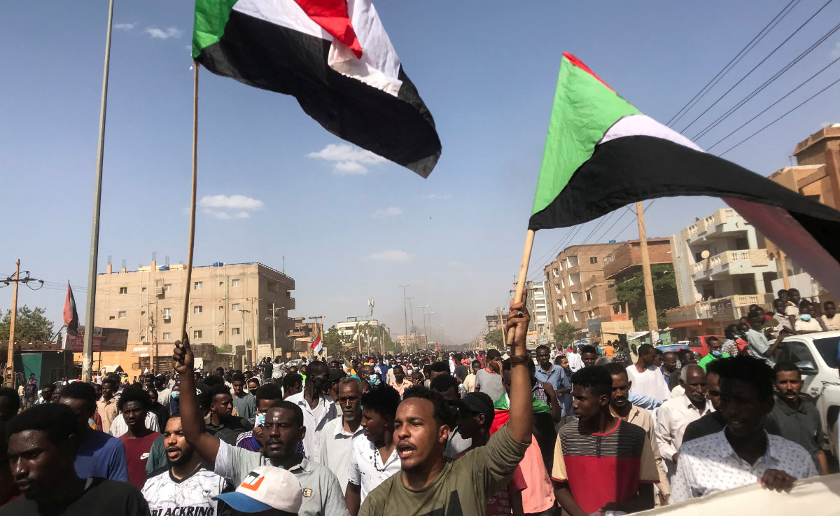 Protesters march in Khartoum on Oct. 30, 2021, against the Sudanese military's recent seizure of power and ousting of the civilian government. (REUTERS/Mohamed Nureldine)