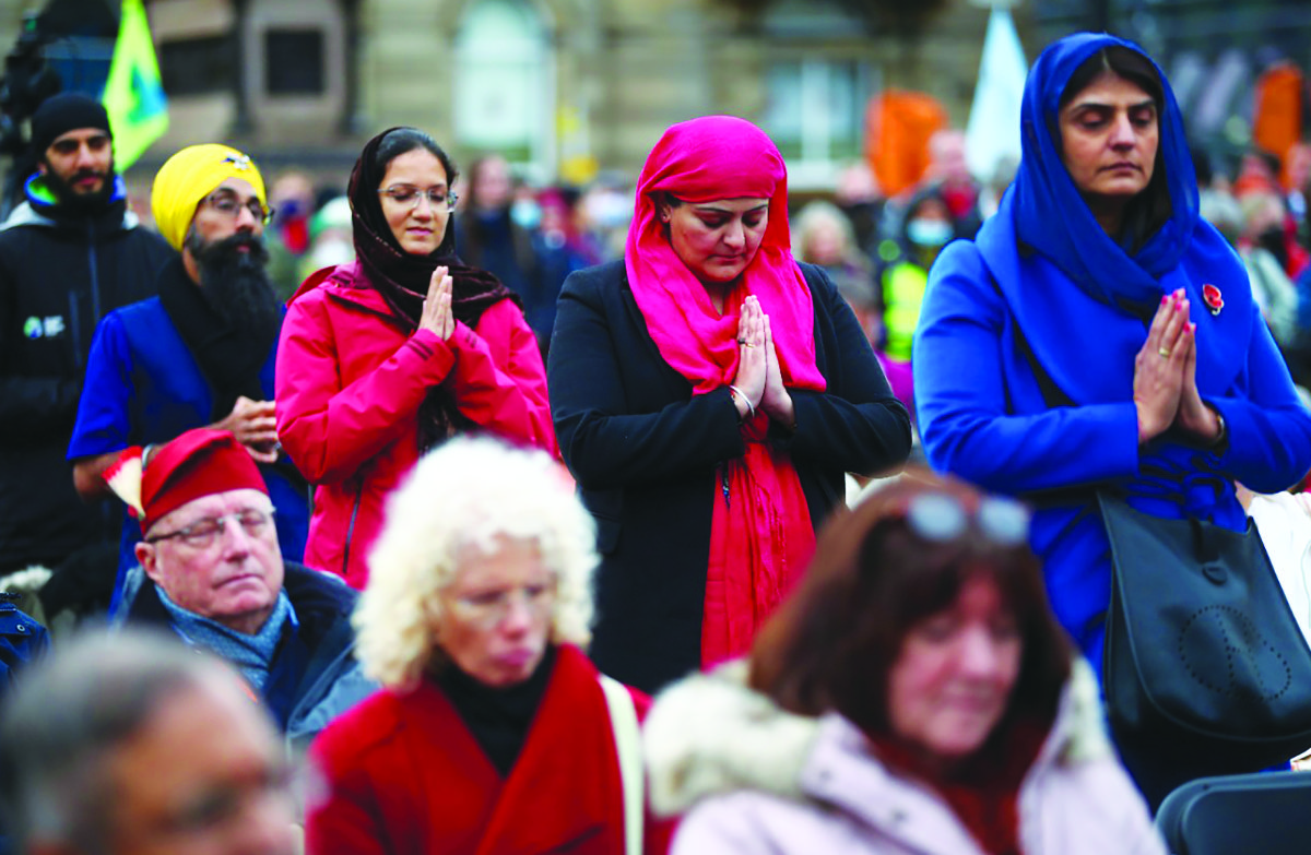 Religious leaders and faith community members hold a COP26 vigil and lead a prayer ahead of the UN Climate Change Conference (COP26) in Glasgow, Scotland on Sunday. (Reuters)