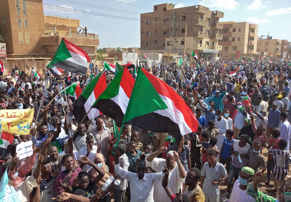 Sudanese anti-coup protesters attend a gathering in the capital Khartoum’s twin city of Omdurman on Oct. 30, 2021. (AFP)