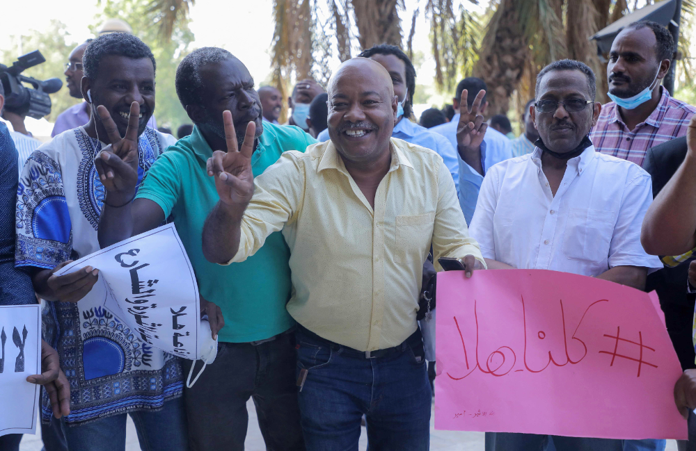 Sudanese journalists rally in front of Hala 96 radio station’s headquarters in   Khartoum on Friday to protest its closure following a coup in October. (AFP)