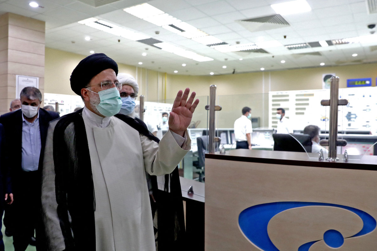 A handout picture provided by the Iranian presidency on Oct. 8, 2021 shows Iran's President Ebrahim Raisi visiting the Bushehr Nuclear Power Plant. (AFP) 