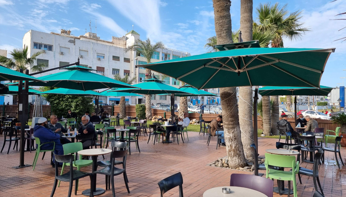 People gather in a cafe in Libya's capital Tripoli on Dec. 23, 2021. Libyans have voiced a mix of frustration and anxiety after elections set for Dec. 24 were postponed. (Mahmud Turkia/ AFP)