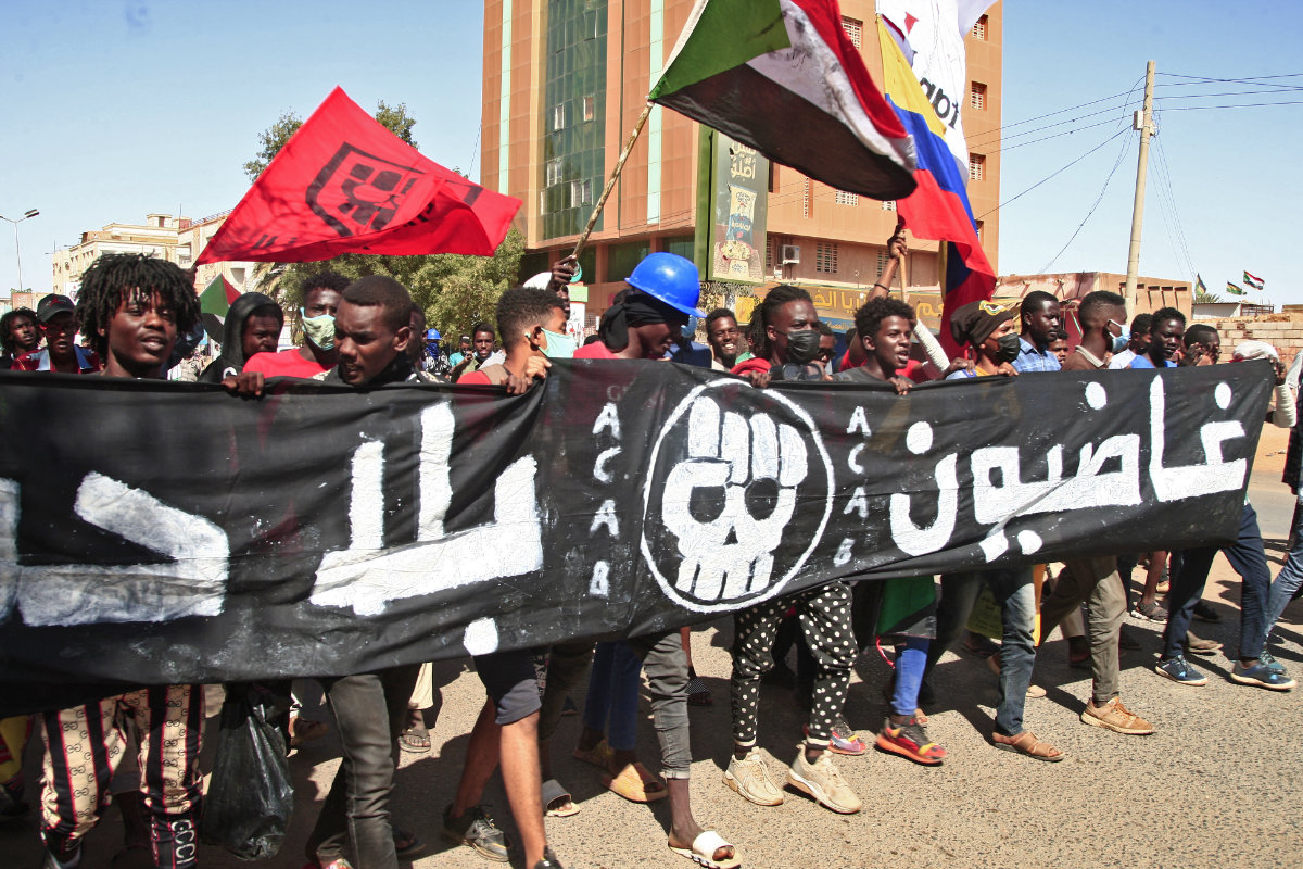 Sudanese protesters call for civilian rule during a rally in Khartoum's twin city of Umdurman on Feb. 14, 2022. (AFP)