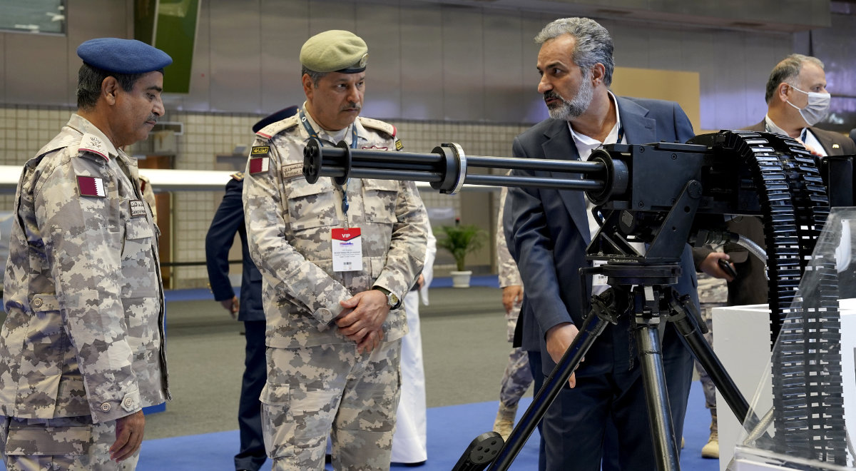 Qatari armed forces chief of staff, Maj. Gen. Salem al-Nabet, visits Iran's pavilion during the DIMDEX exhibition in Doha on March 23, 2022. (AP Photo/Lujain Jo) 