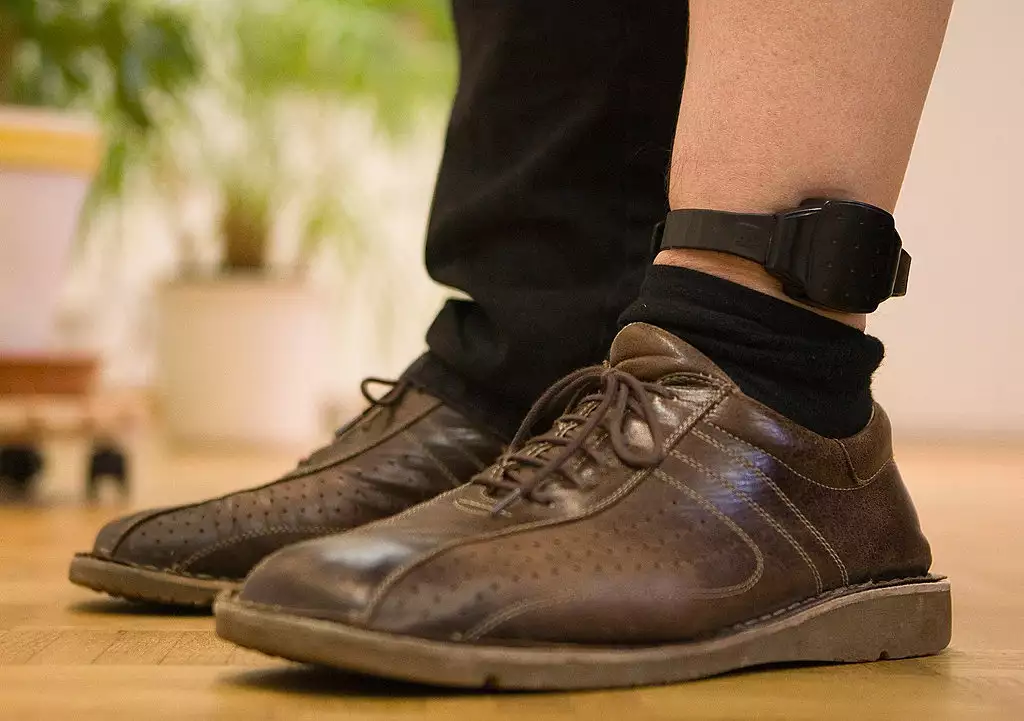 Electronic ankle monitors will be fixed on detainees waiting to receive final court rulings in what the government says is “the first scheme of its kind in the kingdom.” (Reuters/File Photo)