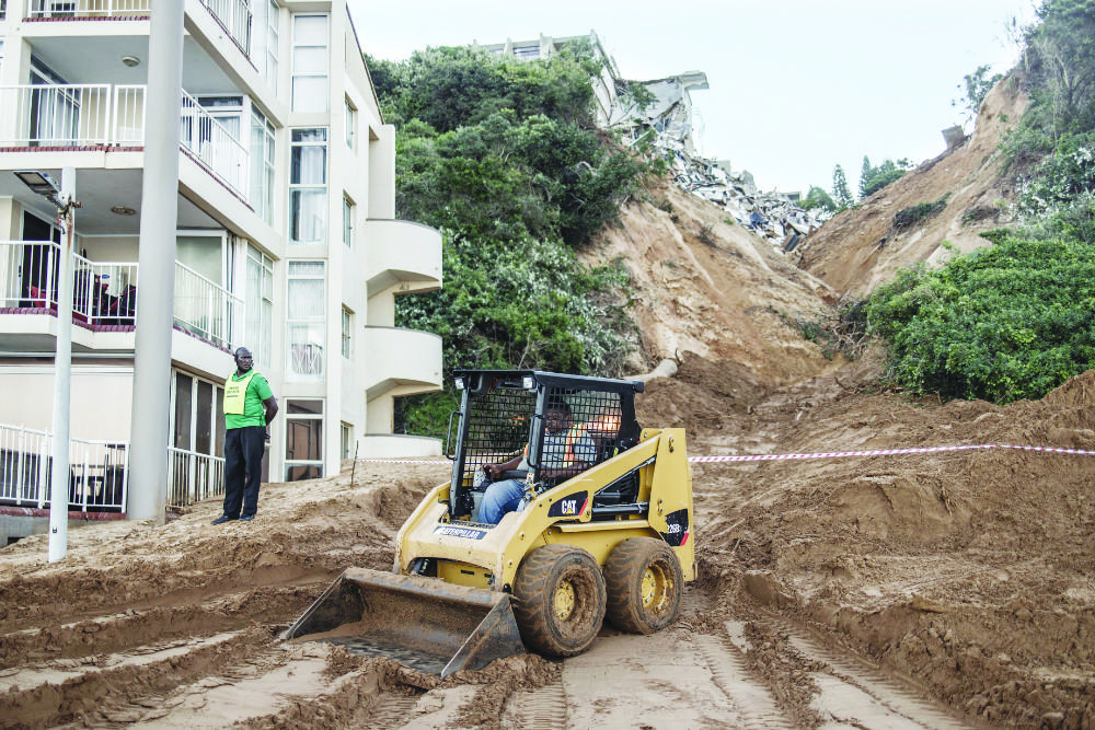 The heaviest rainfall in six decades has swept away homes and destroyed infrastructure in the city of Durban and KwaZulu-Natal province in South Africa. (AFP)