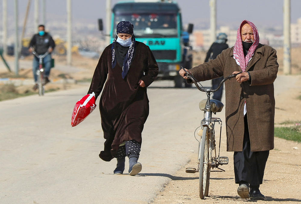 Syrian refugees walk in the Zaatari refugee camp, north of the Jordanian capital Amman. (AFP file photo)