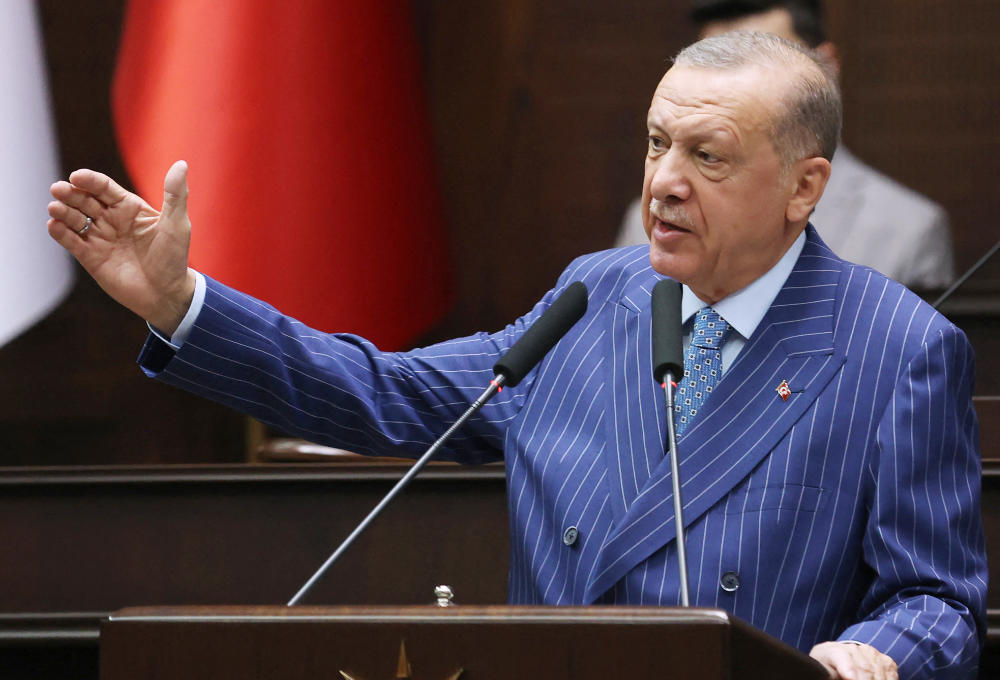 Turkish President Recep Tayyip Erdogan delivers a speech during his party’s parliamentary group meeting in Ankara on June 15, 2022. (AFP)