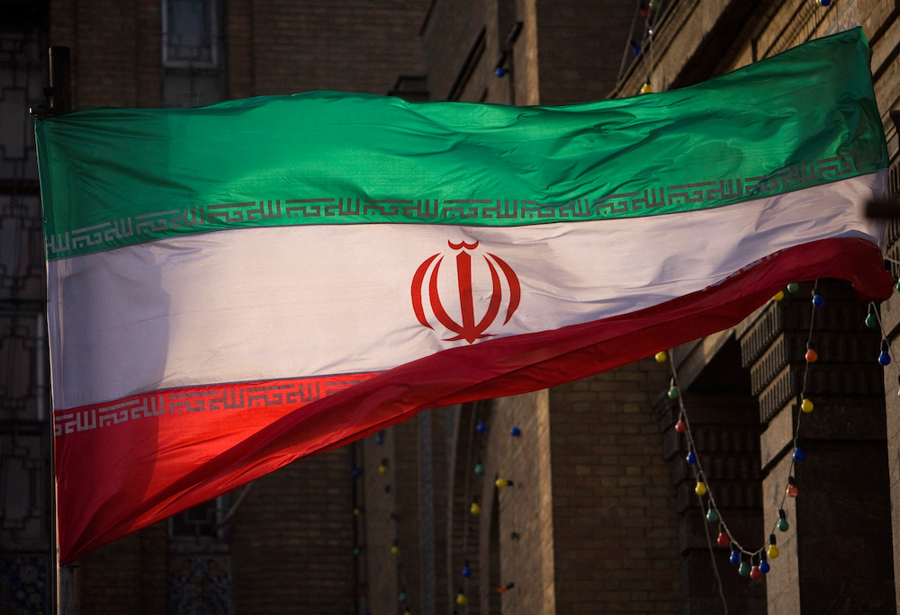 Iranian flag is pictured in front of Iran’s Foreign Ministry building in Tehran. (File/Reuters)