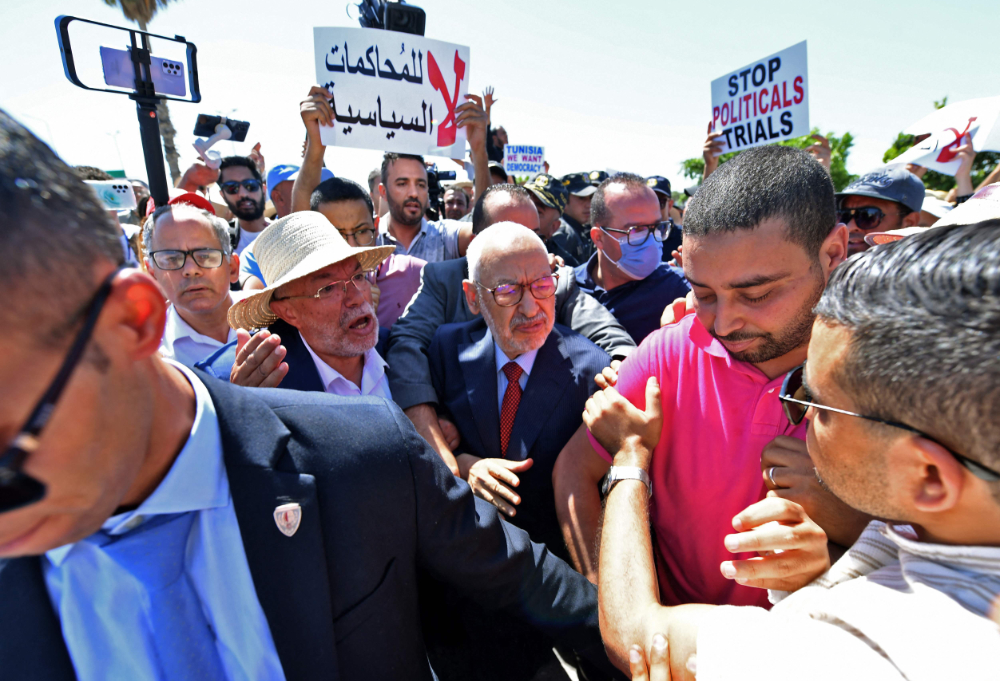 Rached Ghannouchi, head of Tunisia's Islamist Ennahda party, arrives at the office of Tunisia's counter-terrorism prosecutor in Tunis on July 19, 2022. (AFP)