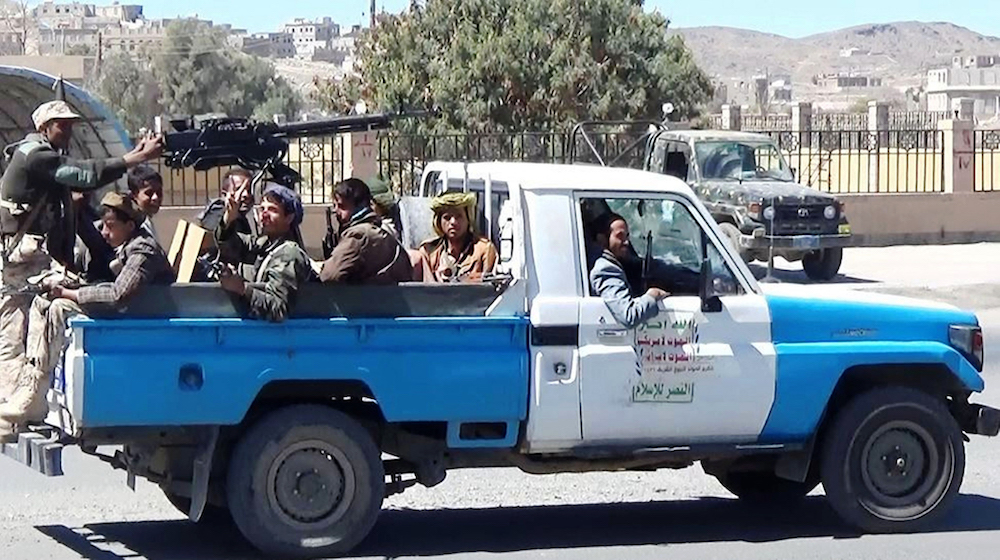 Houthi fighters are seen in an armed vehicle in the Al-Bayda province, south of Sanaa. (File/AFP)