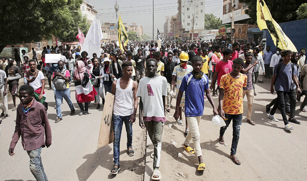 Sudanese demonstrators take to the streets on Sunday, calling for civilian rule and denouncing the military administration in Khartoum. (AP)