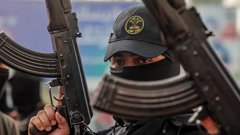 On April 17, 2022, members of the Palestinian Islamic Jihad militant group take part in a demonstration marking Palestinian Prisoners' Day in Rafah, in the southern Gaza strip. (AFP/File Photo)