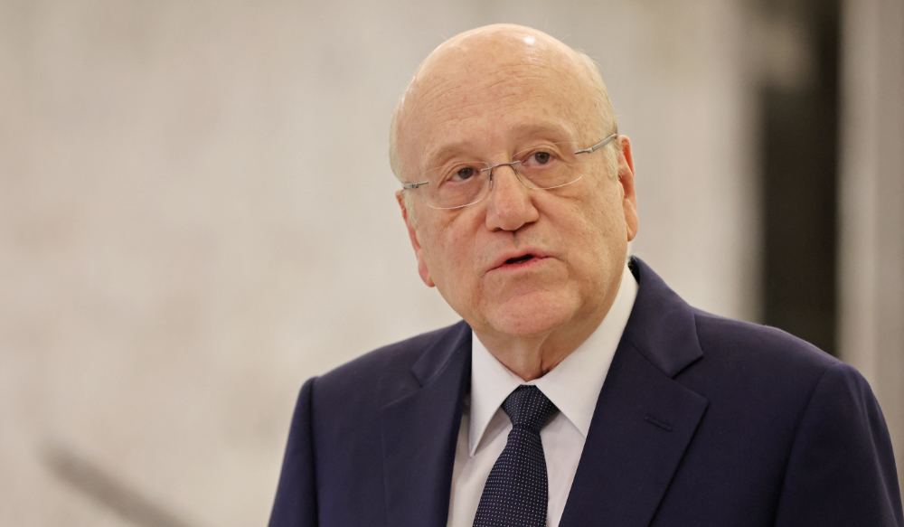 Lebanon's caretaker Najib Mikati speaks following his meeting with the president at the presidential palace in Baabda, east of the capital Beirut, on June 23, 2022. (AFP)