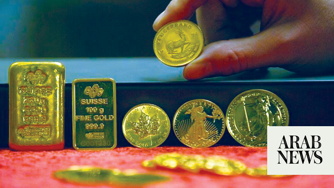 Gold edges back toward highest since January, as dollar holds near lows ...