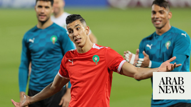 Saiss and Hakimi embrace after stunning Morocco success