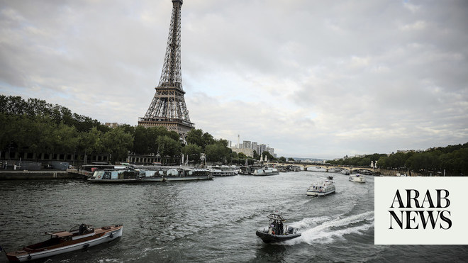 Boats cruise the Seine river in a rehearsal for the Paris Olympics’ opening ceremony