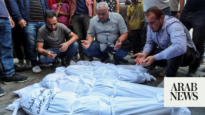 Israel sends scores of bodies to Gaza; Palestinians demand details before burying them