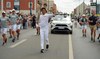 ‘An achievement for all Arabs’: PSG President Nasser Al-Khelaifi takes part in Olympic Torch Relay in Paris ahead of opening ceremony