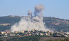 Smoke billows following an Israeli airstrike in the southern Lebanese border village of Chihine on July 28, 2024. (AFP)