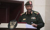 Sudan’s military says its top commander survived a drone strike that killed 5 at an army ceremony
