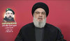 Hezbollah leader Sayyed Hassan Nasrallah gives a televised address, during the funeral of Fuad Shukr.